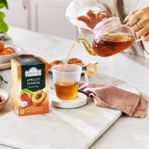 MELNĀ TĒJA AHMAD APRICOT SUNRISE, MAISIŅOS FOLIJA APLOKSNĒS (009539) J